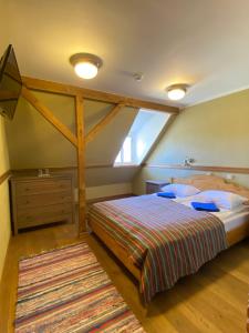 Säng eller sängar i ett rum på Sepikoja Guest House