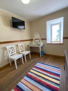 Televiisor ja/või meelelahutuskeskus majutusasutuses Sepikoja Guest House