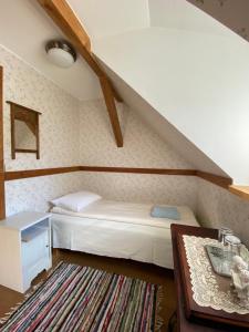 Postel nebo postele na pokoji v ubytování Sepikoja Guest House