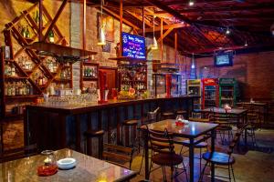 a bar with tables and chairs in a restaurant at Wet Water Resort - Lakefront Retreat Near Colombo Airport in Gampaha +31 photos