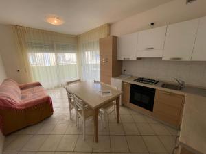 Kuchyň nebo kuchyňský kout v ubytování Residence Gianka - Agenzia Cocal
