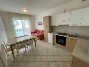 Kuchyň nebo kuchyňský kout v ubytování Residence Gianka - Agenzia Cocal