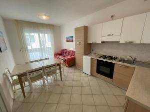 Kuchyň nebo kuchyňský kout v ubytování Residence Gianka - Agenzia Cocal