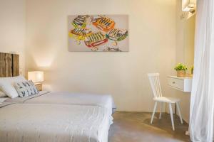 Posteľ alebo postele v izbe v ubytovaní Kaminia Beach Villa