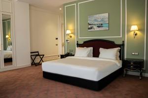 Cama o camas de una habitación en ANIM Boutique Hotel