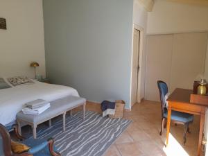 Letto o letti in una camera di La Chambre Verte