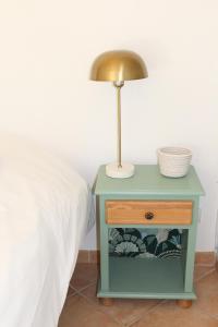 Letto o letti in una camera di La Chambre Verte