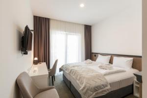 Krevet ili kreveti u jedinici u okviru objekta Hotel Crni Vrh
