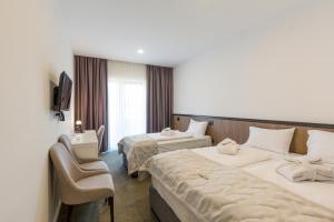 Krevet ili kreveti u jedinici u okviru objekta Hotel Crni Vrh