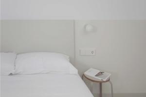 Postel nebo postele na pokoji v ubytování HOTEL LA FONDA B&B
