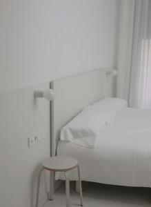 Postel nebo postele na pokoji v ubytování HOTEL LA FONDA B&B
