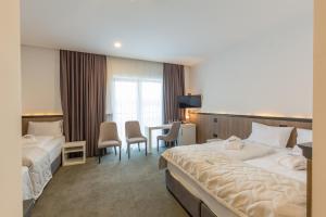 Krevet ili kreveti u jedinici u okviru objekta Hotel Crni Vrh