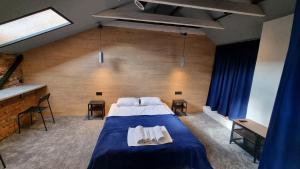 Ліжко або ліжка в номері Central Hotel