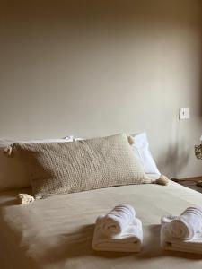 A bed or beds in a room at Masía La Costereta