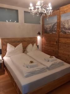Postel nebo postele na pokoji v ubytování Das Kitz - deLuxe ChaletApartments
