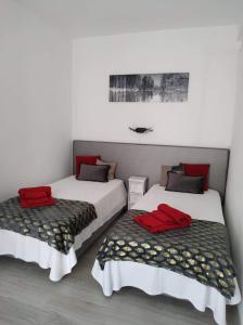 Ένα ή περισσότερα κρεβάτια σε δωμάτιο στο Casa da Vila