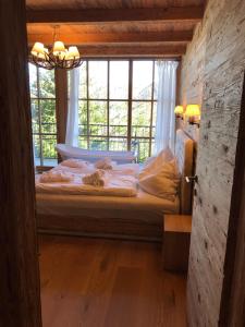 Postel nebo postele na pokoji v ubytování Das Kitz - deLuxe ChaletApartments