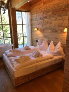 Postel nebo postele na pokoji v ubytování Das Kitz - deLuxe ChaletApartments