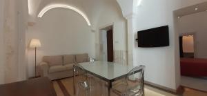 A television and/or entertainment centre at Appartamento Palazzo Ancona