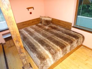 Ein Bett oder Betten in einem Zimmer der Unterkunft Hotel Grivitsa