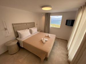 Un pat sau paturi într-o cameră la Villa Margarita