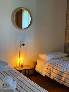 A bed or beds in a room at Masía La Costereta