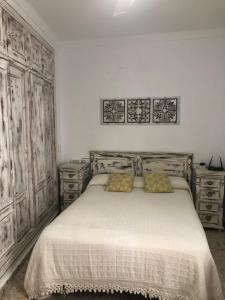 Postel nebo postele na pokoji v ubytování apartamento el levante