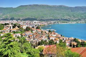 a view of a city and a body of water at Apartment V in Ohrid