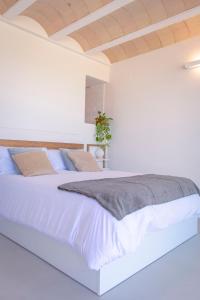 A bed or beds in a room at Estrellas de Gredos