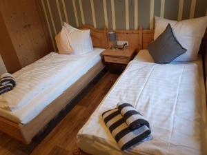 Postel nebo postele na pokoji v ubytování Pension Lindenhof