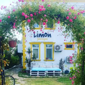 a building with a sign that reads limonym pavilion at Limon Pansiyon in Foça