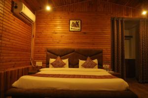 Ένα ή περισσότερα κρεβάτια σε δωμάτιο στο HOA Resorts - Mountain View with Infinity Pool