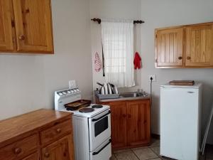 Kuchyň nebo kuchyňský kout v ubytování Uyolo Guest Logde