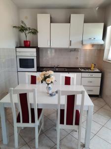 Kuchyň nebo kuchyňský kout v ubytování Apartments Dalmatia