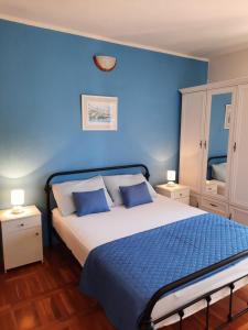 Postel nebo postele na pokoji v ubytování Apartments Dalmatia