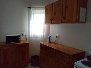 Kuchyň nebo kuchyňský kout v ubytování Uyolo Guest Logde
