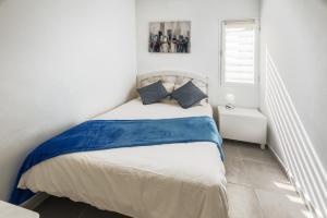 Postel nebo postele na pokoji v ubytování Lanzahost Carmenes Dreams