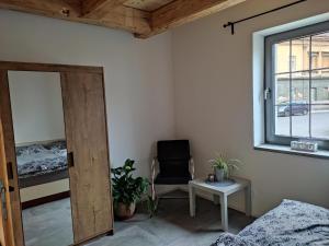 Postel nebo postele na pokoji v ubytování Rezidence Valcha