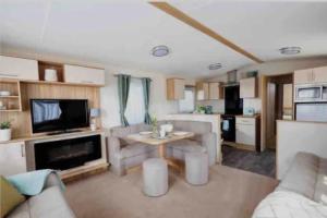 Kuchyň nebo kuchyňský kout v ubytování AJL Caravan Rentals