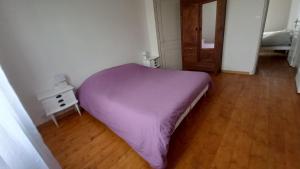Postel nebo postele na pokoji v ubytování Gîte albertin