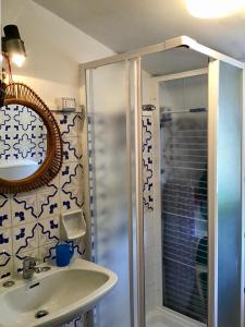 Kylpyhuone majoituspaikassa La mansarda di Matilde