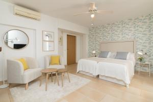 A bed or beds in a room at iloftmalaga Carretería - Puerta de Antequera