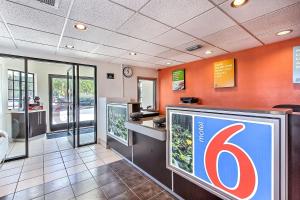 a fast food restaurant with a sign on the wall at Motel 6-Fremont, CA - North in Fremont