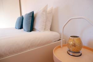 Ένα ή περισσότερα κρεβάτια σε δωμάτιο στο Retiro de Gondramaz - Whole house, Casa inteira 200 m2