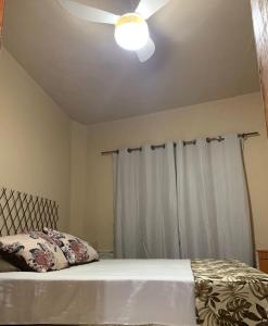 Katil atau katil-katil dalam bilik di Casa grande em Arraial do Cabo