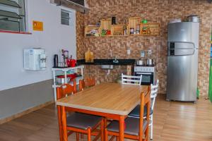 Kuchyň nebo kuchyňský kout v ubytování Aldeia Hostel II