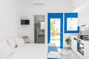Posteľ alebo postele v izbe v ubytovaní Rose of Tinos