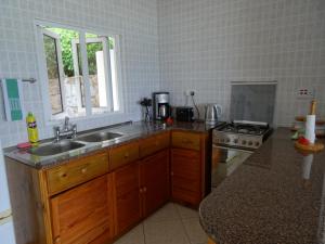 Cucina o angolo cottura di Sailfish Beach Villas