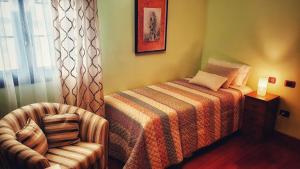 A bed or beds in a room at Casa Lucas Még 34 kép