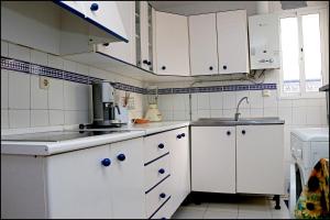 Kuchyň nebo kuchyňský kout v ubytování Apartamento El Carmen